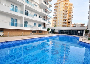 Светлые апартаменты 2+1 в Махмутларе 