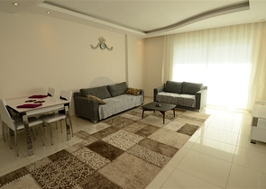 Светлые апартаменты 2+1 в Махмутларе 