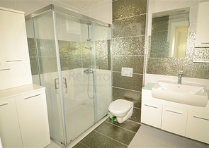 Светлые апартаменты 2+1 в Махмутларе 