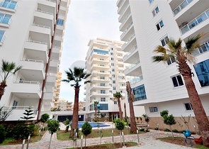 Светлые апартаменты 2+1 в Махмутларе 