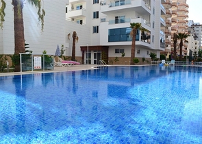 Светлые апартаменты 2+1 в Махмутларе 