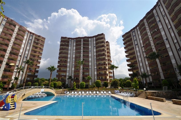 Просторная квартира 2+1 в шикарном комплексе в Махмутларе