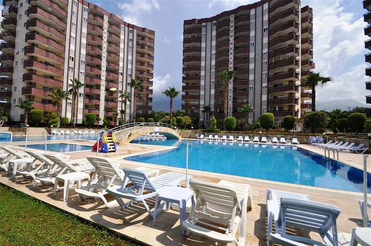 Просторная квартира 2+1 в шикарном комплексе в Махмутларе