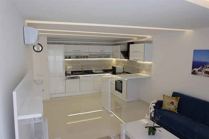 Апартаменты 1+1 в центре курортной жизни в Аланье