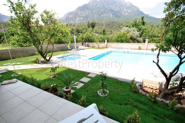 Квартира 1+1  с видом на горы в Асланбуджаке Кемере