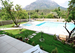 Квартира 1+1  с видом на горы в Асланбуджаке Кемере