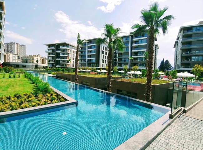 Мега проект в Анталии в районе Гюрсу Коньяалты 500 метров до моря 