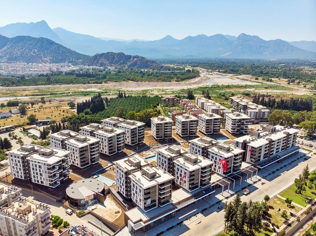 Мега проект в Анталии в районе Гюрсу Коньяалты 500 метров до моря 