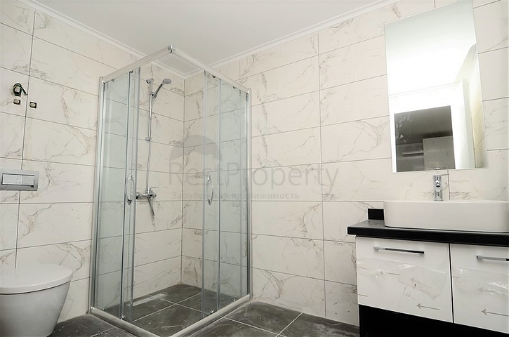 Двухкомнатные апартаменты в новом комплексе в Махмутларе