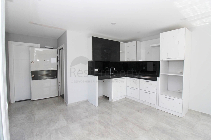 Двухкомнатные апартаменты в новом комплексе в Махмутларе