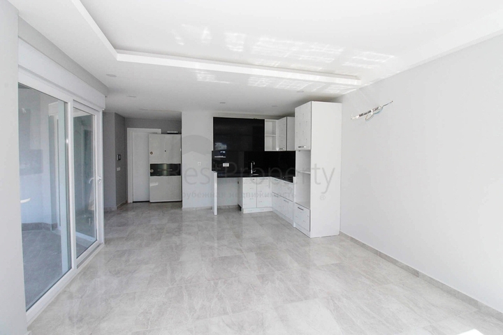 Двухкомнатные апартаменты в новом комплексе в Махмутларе