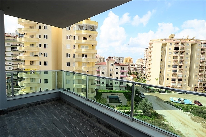 Двухкомнатные апартаменты в новом комплексе в Махмутларе