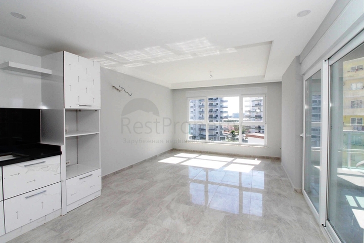 Двухкомнатные апартаменты в новом комплексе в Махмутларе