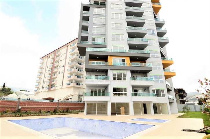 Двухкомнатные апартаменты в новом комплексе в Махмутларе