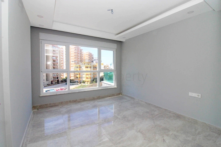 Двухкомнатные апартаменты в новом комплексе в Махмутларе