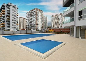 Двухкомнатные апартаменты в новом комплексе в Махмутларе