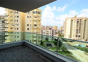 Двухкомнатные апартаменты в новом комплексе в Махмутларе