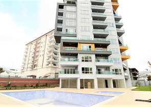 Двухкомнатные апартаменты в новом комплексе в Махмутларе