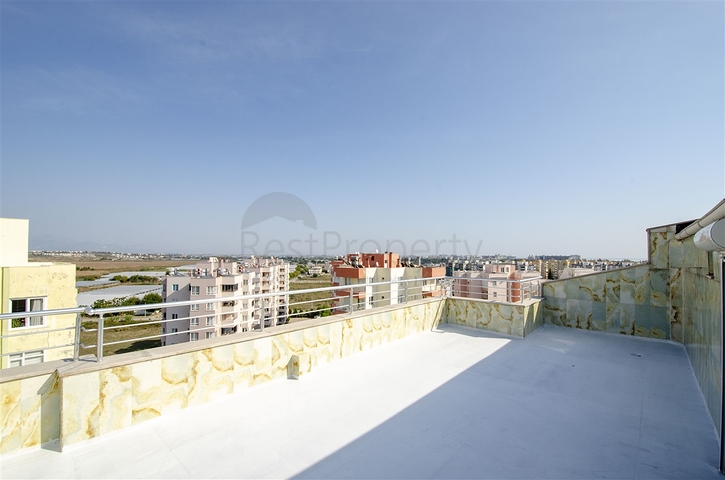 Просторные квартиры 3+1 с мебелью 1 км до моря в Ларе Анталья