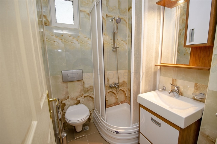 Просторные квартиры 3+1 с мебелью 1 км до моря в Ларе Анталья