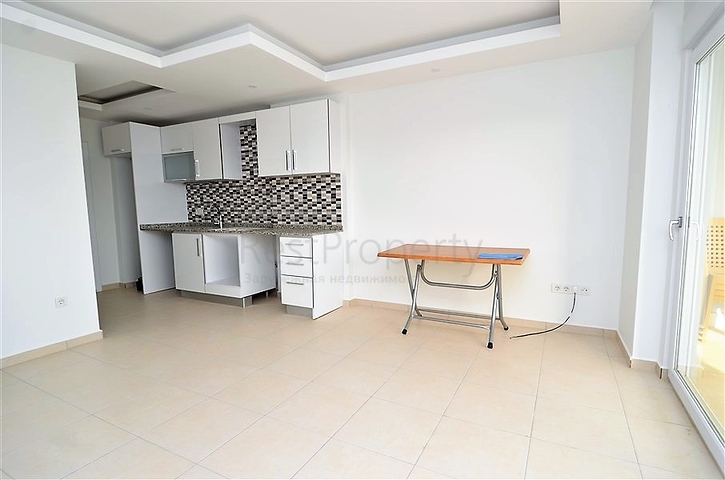 Квартира-студия в современном комплексе в Авсалларе