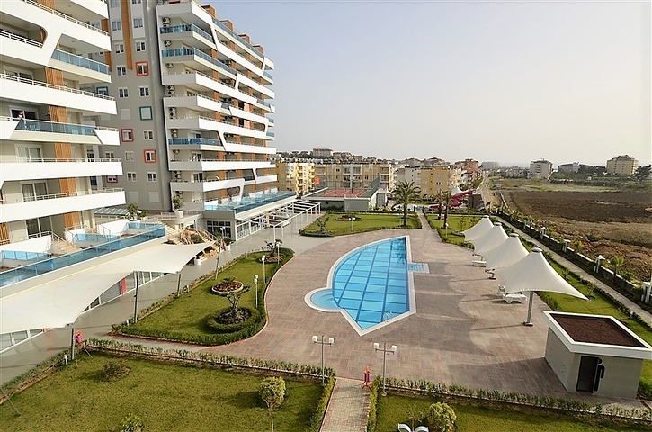 Квартира-студия в современном комплексе в Авсалларе