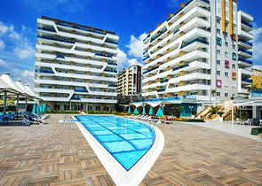 Квартира-студия в современном комплексе в Авсалларе