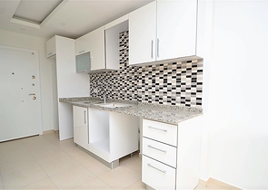 Квартира-студия в современном комплексе в Авсалларе