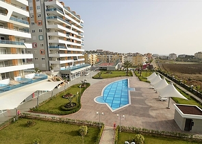 Квартира-студия в современном комплексе в Авсалларе