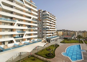 Квартира-студия в современном комплексе в Авсалларе