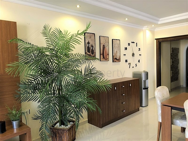 Меблированные апартаменты на первой линии в Махмутларе