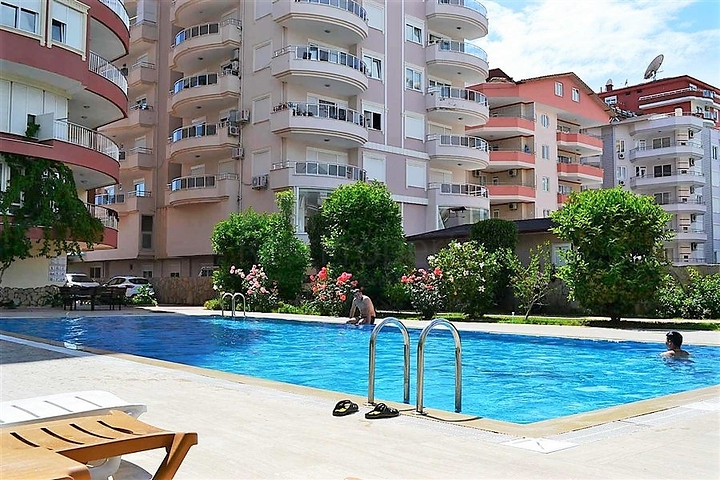 Меблированные апартаменты на первой линии в Махмутларе