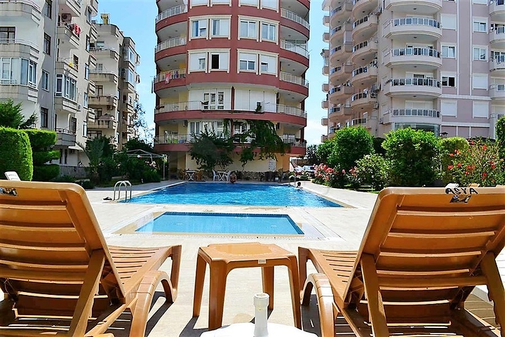 Меблированные апартаменты на первой линии в Махмутларе