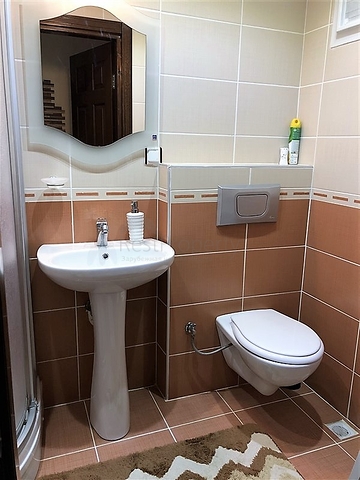 Меблированные апартаменты на первой линии в Махмутларе