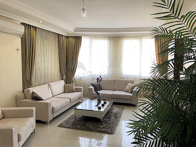 Меблированные апартаменты на первой линии в Махмутларе