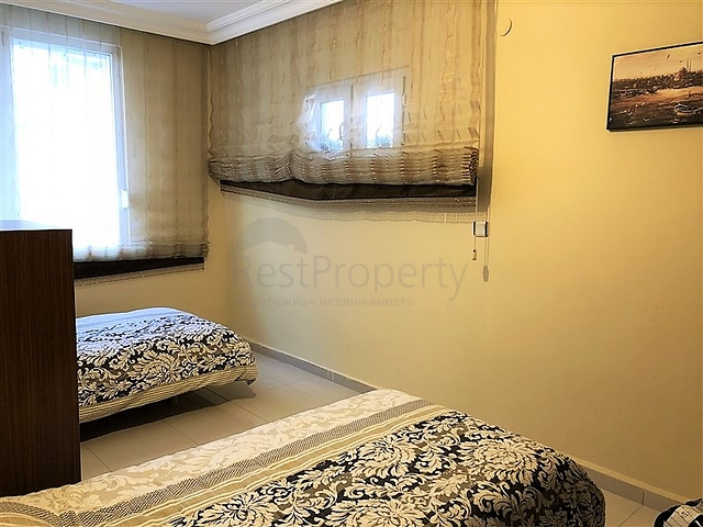 Меблированные апартаменты на первой линии в Махмутларе