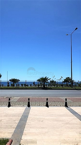 Меблированные апартаменты на первой линии в Махмутларе