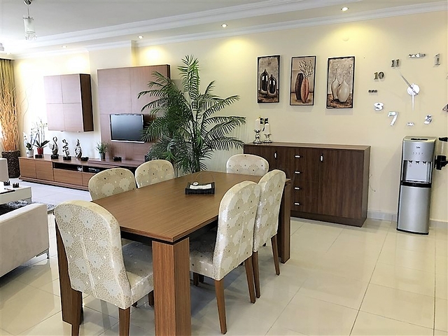 Меблированные апартаменты на первой линии в Махмутларе