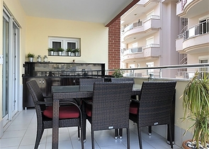 Меблированные апартаменты на первой линии в Махмутларе