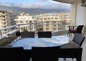 Меблированные апартаменты на первой линии в Махмутларе