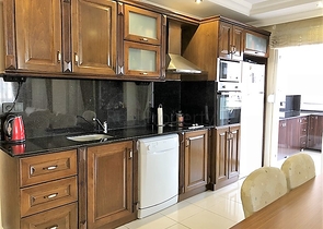 Меблированные апартаменты на первой линии в Махмутларе