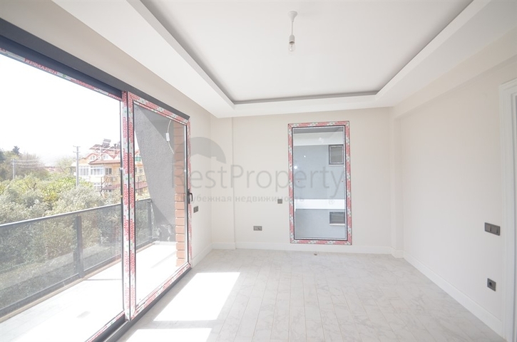 Новая трехэтажная вилла в центре Фетхие