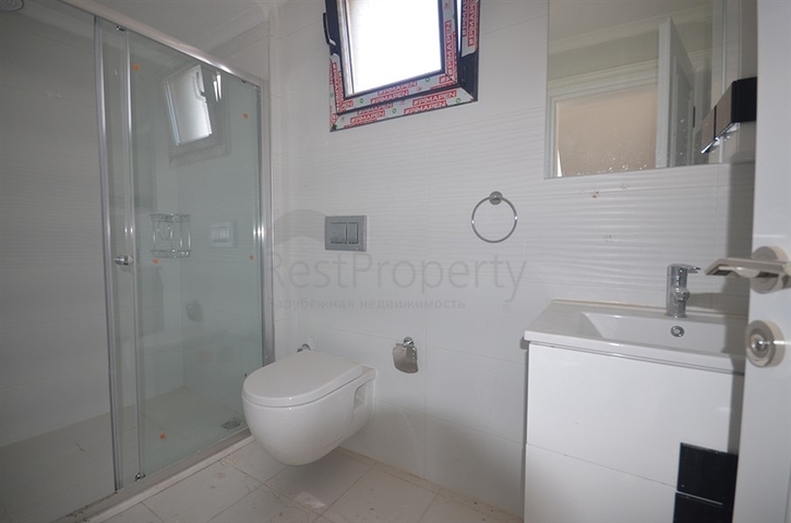 Новая трехэтажная вилла в центре Фетхие