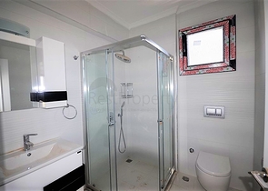 Новая трехэтажная вилла в центре Фетхие