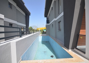 Новая трехэтажная вилла в центре Фетхие