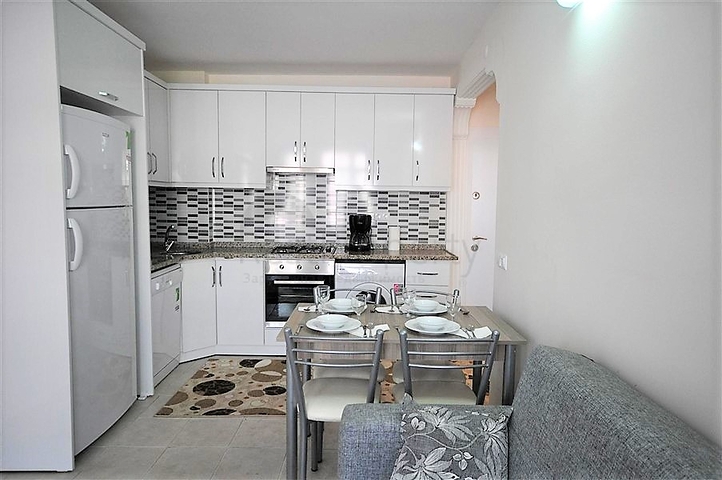 Меблированные апартаменты 1+1 в районе Оба