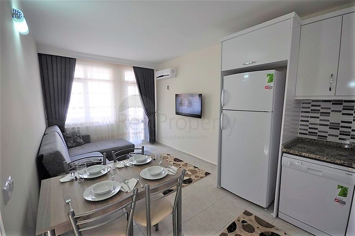 Меблированные апартаменты 1+1 в районе Оба