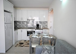 Меблированные апартаменты 1+1 в районе Оба