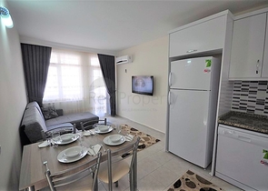 Меблированные апартаменты 1+1 в районе Оба