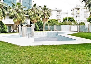 Пентхаус 2+1 с выходом в сад в комплексе 500 м до моря